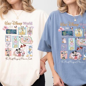 two women wearing t-shirts with Disney World graphics and text.