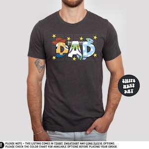 a man wearing a t - shirt with the word dad printed on it