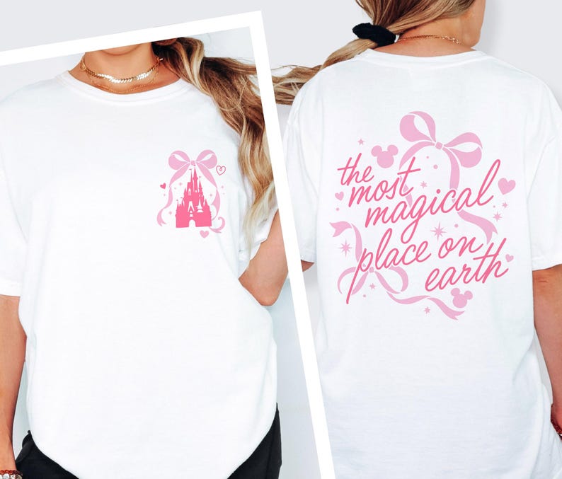 A white t-shirt with a pink castle graphic and text on the back.