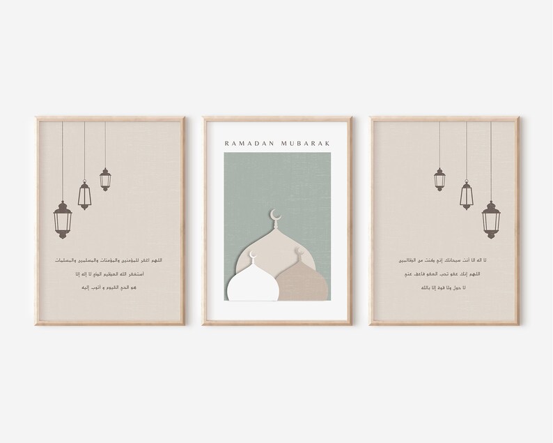 May include: Three printable art prints with a beige background and brown accents. The center print features a mosque with a green background and the text "RAMADAN MUBARAK". The left and right prints feature hanging lanterns and Arabic text.