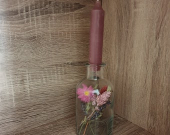 Porte bougie en verre avec fleurs séchées