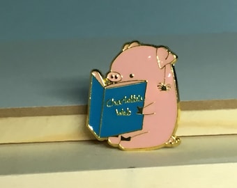 Pig Reading Charlotte’s Web with a Little Spider Enamel Pin