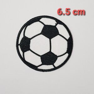 May include: Black and white embroidered soccer ball patch, 6.5 inches in diameter.