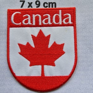 以下が含まれることがあります： メープルリーフと「カナダ」の文字が刺繍された赤と白のワッペン。ワッペンは7センチ×9センチです。