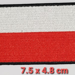 May include: Embroidered patch depicting the Polish flag, a rectangle split horizontally into white and red. The patch has a black border and measures 7.5 x 4.8 cm.
