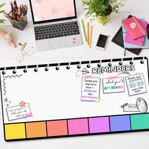 May include: A white dry-erase board with a black frame and a black spiral binding. The board has a grid pattern and is divided into sections. The top section has the word "REMINDERS" written in black. The other sections have colorful sticky notes with text such as "Tackle one task at a time - progress not perfection", "Submit your attendance", and "Review your to do every few hours".