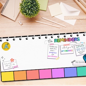 May include: A colorful desk mat with a grid pattern and a black border. The mat has a section for reminders with the text "Tackle one task at a time", "Progress not perfection", "Submit your attendance", "Review your to do every few hours", and "Ms. Smith". The mat also has a section for notes with a yellow, orange, pink, purple, and blue color scheme.