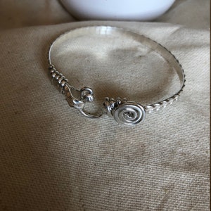 Classic Caribbean swirl hook bracelet in all .925 sterling silver.  Handcrafted wire wrapped bracelet.