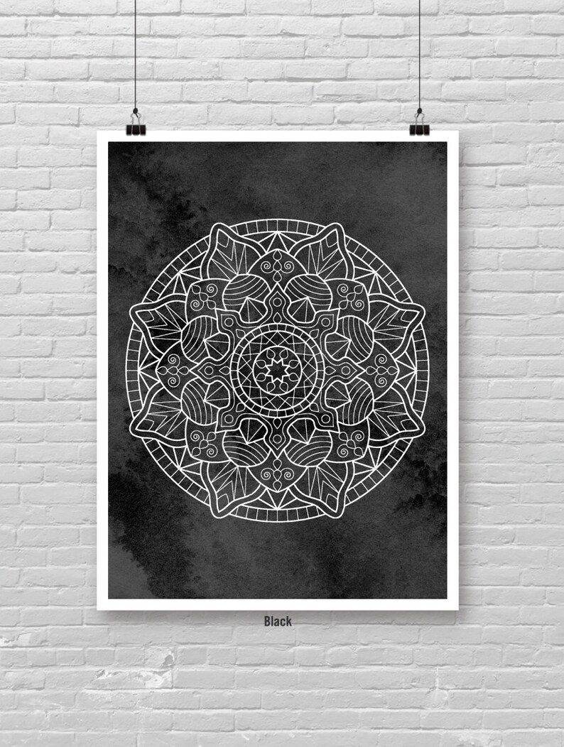 May include: A black and white mandala design on a dark gray background. The mandala is intricate and detailed, with a circular pattern of flowers and leaves.