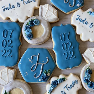 Blue themed engagement cookies , wedding favors