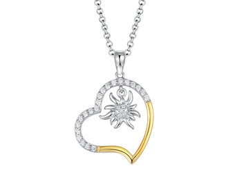 Pendentif Coeur avec petite edelweiss en argent 925 doré