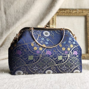 Vintage cheongsam style kiss lock hand bag with navy blue nishijin Japanese traditional patterns style with gold frame, clasp and chain. image 3