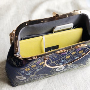 Vintage cheongsam style kiss lock hand bag with navy blue nishijin Japanese traditional patterns style with gold frame, clasp and chain. image 6