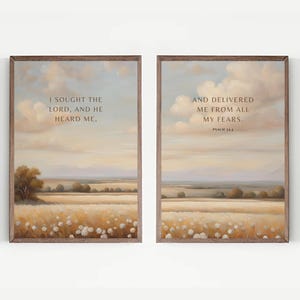 May include: Two framed landscape art prints. The left print reads "I sought the Lord, and He heard me." The right print reads "And delivered me from all my fears." Both feature a field and sky.