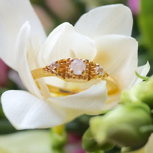 Vintage style ring- Crafted in sterling silver and coated in thick 9ct gold.  Set with white topaz and rainbow moonstone.