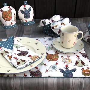 Table decoration placemat, cutlery bag, egg basket, egg warmer, bread basket / utensil holder, doily in cotton fabric: THE FUNNY CHICKENS