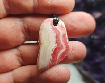 Handmade Argentinian Rhodochrosite Pendant: Compassionate Heart Stone