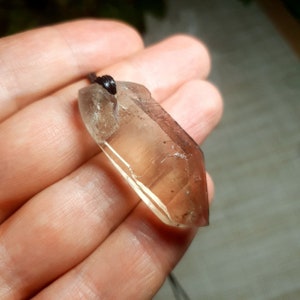 Cathedral smoky quartz crystal pendant with aegirine inclusions