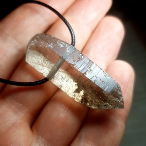 Cathedral smoky quartz crystal pendant with aegirine inclusions
