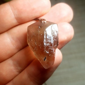 Cathedral smoky quartz crystal pendant with aegirine inclusions