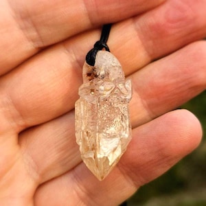 UV reactive Petroleum Quartz pendant. Petroleum Scepter Quartz necklace