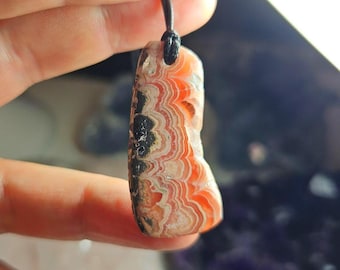 Handmade Argentinian Rhodochrosite Pendant: Compassionate Heart Stone