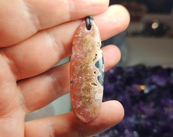 Handmade Argentinian Rhodochrosite Pendant: Compassionate Heart Stone