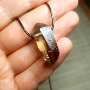 Cathedral smoky quartz crystal pendant with aegirine inclusions