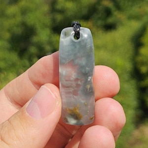 Interesting clear quartz crystal pendant with grey clouds from Brazil