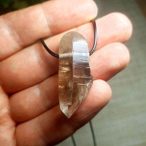Amazing cathedral smoky quartz crystal pendant with aegirine inclusions