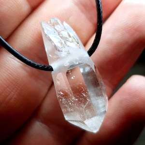 Beautiful lustrous multi-terminated and clear Himalayan quartz crystal pendant. DT quartz crystal pendant