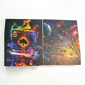 May include: Two guitar pickguards with unique designs. One features a flaming Ace of Spades card, the other a vibrant galaxy scene. Both are black with pre-drilled holes for easy installation on an electric guitar.