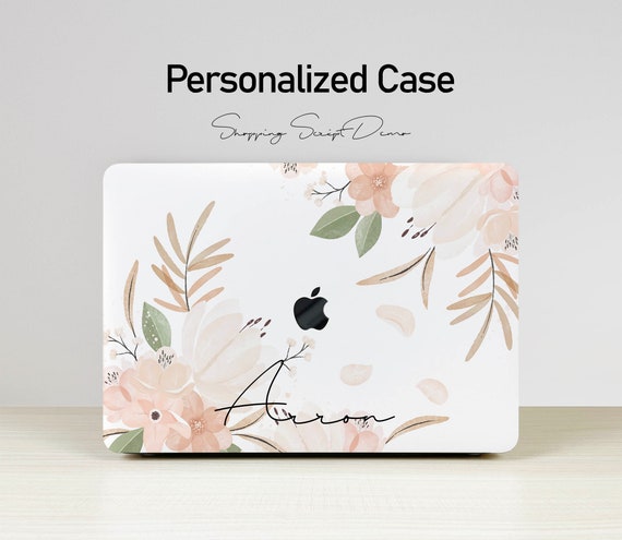 フレッシュピンクの花と草のデザインが施された、MacBook Air 11/13