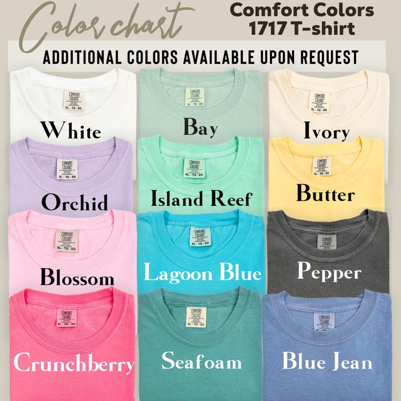 May include: A colour chart displaying Comfort Colors 1717 T-shirts in a range of shades. The image shows folded t-shirts in colours such as white, bay, ivory, orchid, island reef, butter, blossom, lagoon blue, pepper, crunchberry, seafoam, and blue jean. Additional colours available on request.