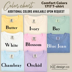 May include: A color chart showcasing Comfort Colors 1717 T-shirts in various hues. The image displays shirts in Butter, Ivory, Bay, White, Blossom, Blue Jean, Chambray, and Orchid. Additional colors are available upon request.