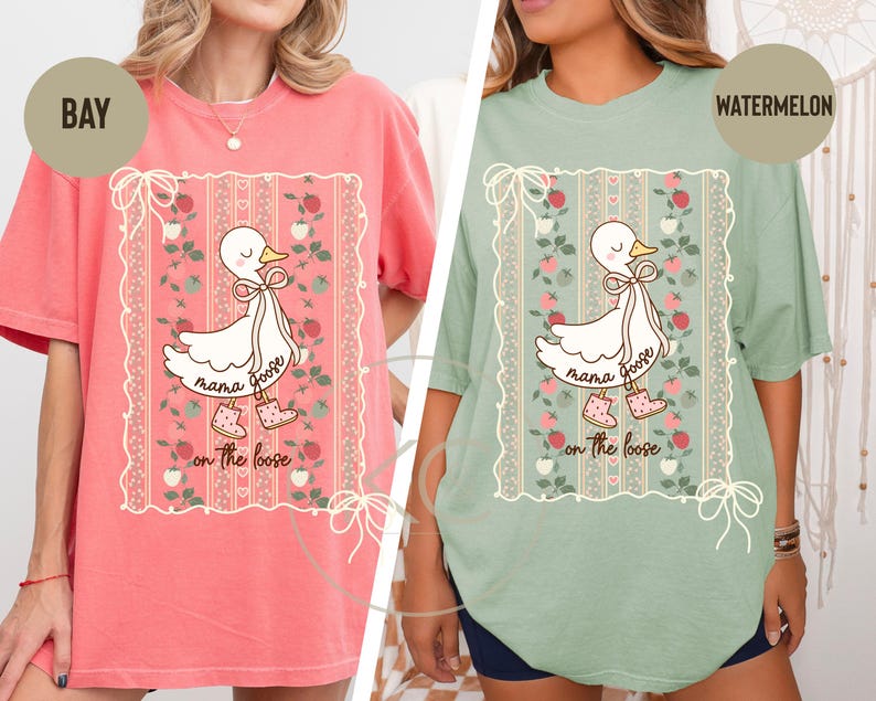 May include: Two oversized t-shirts, one bay and one watermelon, featuring a cartoon goose design. The goose is wearing boots and a bow, with the words "mama goose on the loose" printed below. The design is framed by a floral border.
