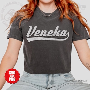 May include: A black cropped t-shirt with a white vintage-style graphic that says "Veneka".