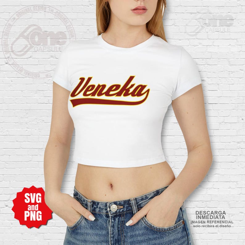 May include: White crop top with short sleeves featuring the word "Veneka" in a red and gold baseball-style font.