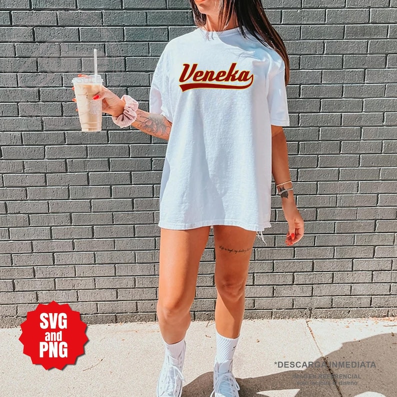 May include: White t-shirt with the name "Veneka" in a red vintage-style font. The shirt is oversized and has a relaxed fit.