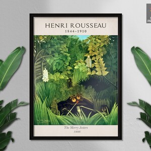 May include: A framed print of a painting by Henri Rousseau titled "The Merry Jesters" depicting a jungle scene with a group of figures in the center. The painting is dated 1906 and the artist's name and dates are listed below the title.