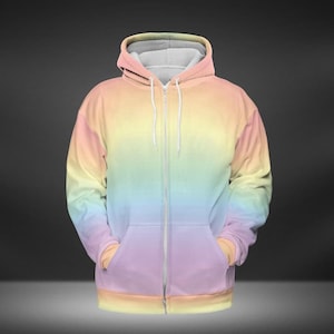 May include: A pastel rainbow ombre zip-up hoodie with a white zipper and a hood.