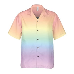 May include: A short-sleeved button-down shirt with a rainbow ombre design. The shirt has a classic collar and a relaxed fit.