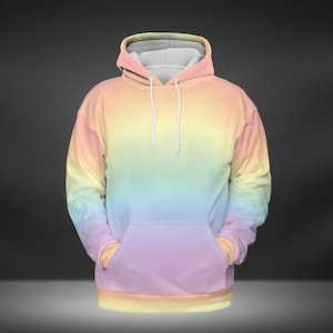 May include: A rainbow ombre hoodie with a drawstring hood and a kangaroo pocket. The hoodie is made of a soft, comfortable fabric and features a relaxed fit.
