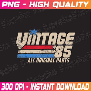 May include: Vintage 1985 graphic design with a red, white, and blue color scheme. The text "Vintage 85" is in a bold, retro font with a distressed effect. The text "All Original Parts" is below the main text in a smaller font.