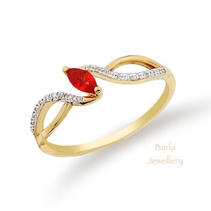 14k Gold Marquise Garnet Ring with Diamond Accents