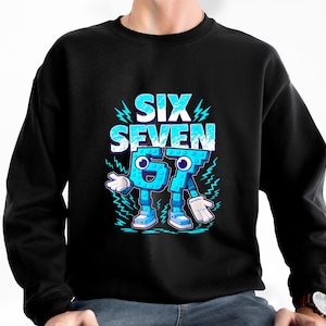 May include: Black sweatshirt featuring the words "SIX SEVEN" in blue and white, with a cartoon character design for the numbers. The numbers have arms, legs, and faces, and are surrounded by blue lightning bolts.