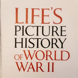 May include: A book cover with the title "LIFE'S PICTURE HISTORY OF WORLD WAR II" in red and black text. The subtitle "TIME INCORPORATED - NEW YORK - 1950" is printed in black text below the title.