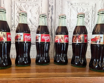Vintage 1990 Coca Cola Six-pack of 6.5 Oz. Never Opened Bottles