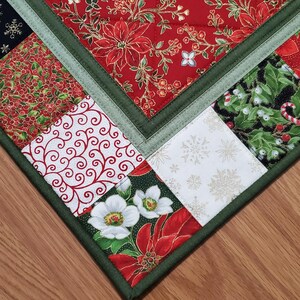 Frosted Holly Quilted Table Topper NCU0PTT1266