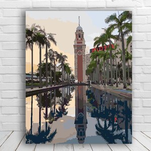 May include: A painting of a clock tower reflected in a pool of water. The tower is red brick with a white clock face and a green roof. Palm trees line the sides of the pool, and the sky is a soft blue with pink clouds.